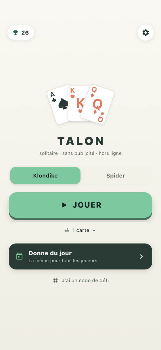 Écran d’accueil avec le bouton Jouer et la donne du jour